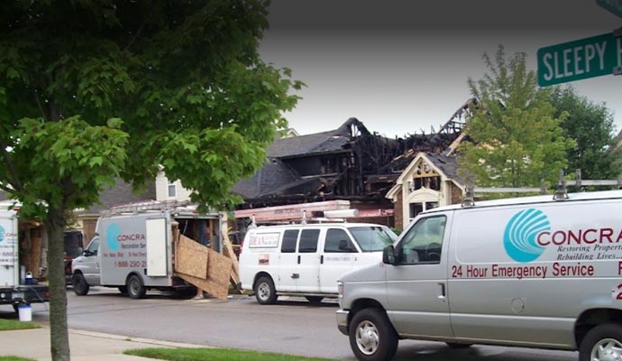 Concraft service van at fire damaged area