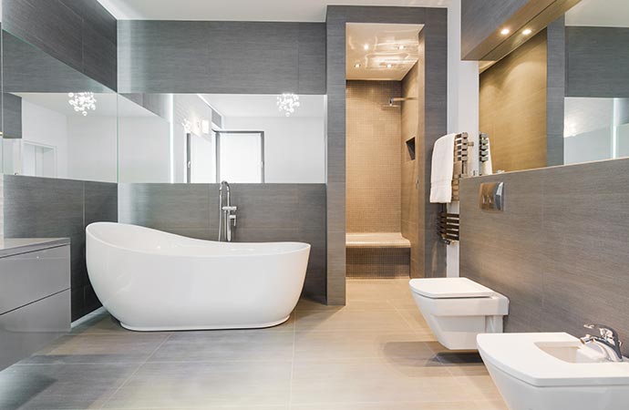 a modern bathroom interior with varity of grey tiles