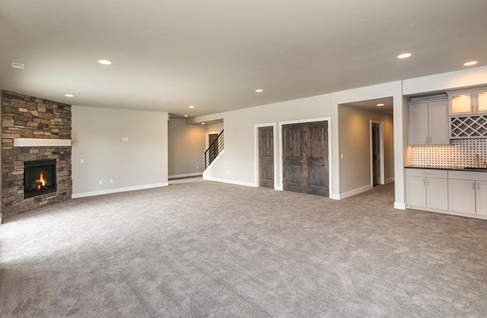 a remodeled living area with a spacious and modern design