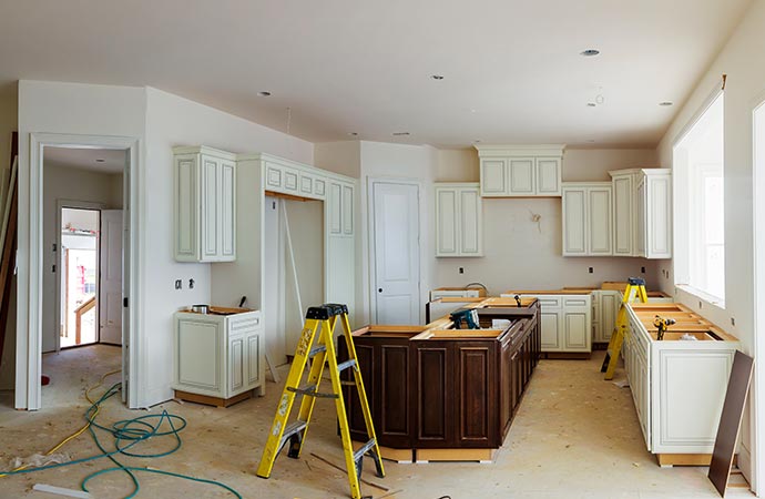  a kitchen undergoing a remodeling process