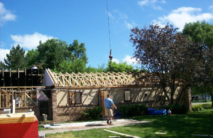 a residential construction site where roof replacement is taking place