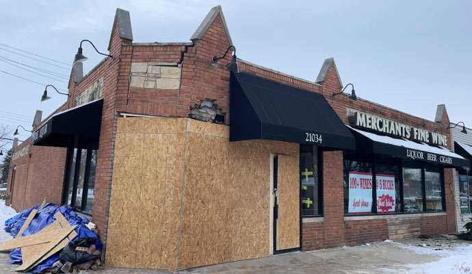 boarded-up store front