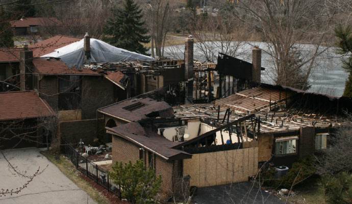 Aerial view of a house severely damaged by fire