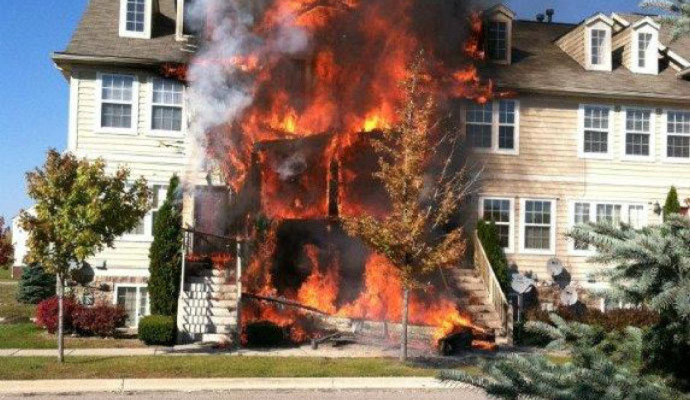 Fire burning a house