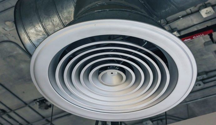 Clean ceiling air vent Clean ceiling air vent free of dust and debris
