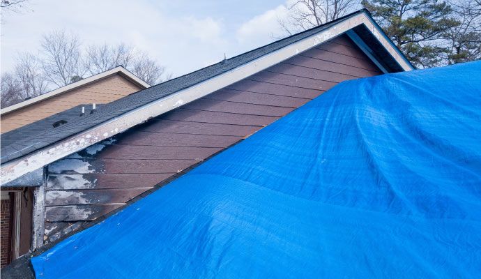 Roof tarping service Roof tarping service
