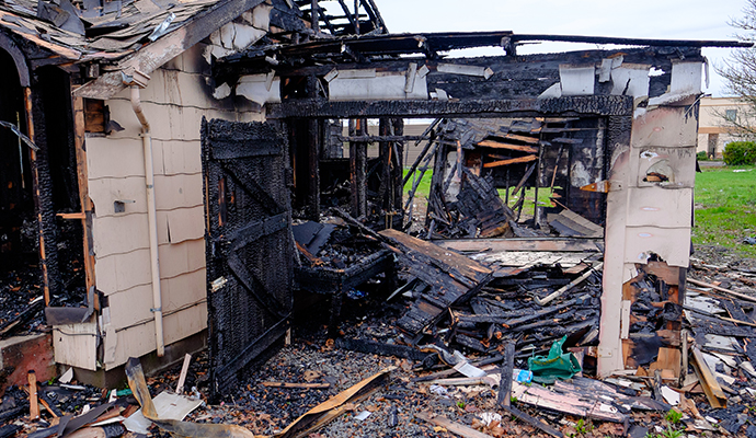 Severely burned house Severely burned house