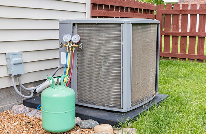 a heating unit place in backyard a house