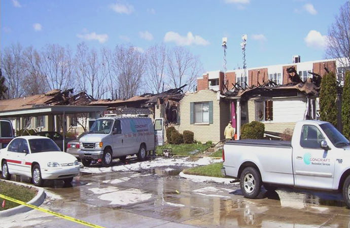 some concraft standing on the street to provide restoration service