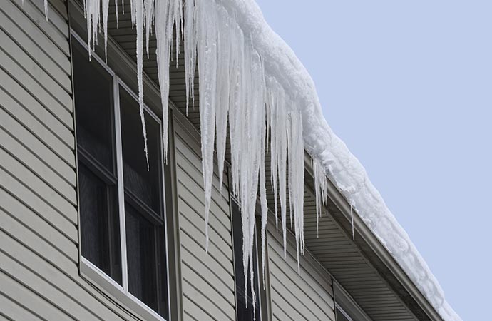 Heavy snow damaged house