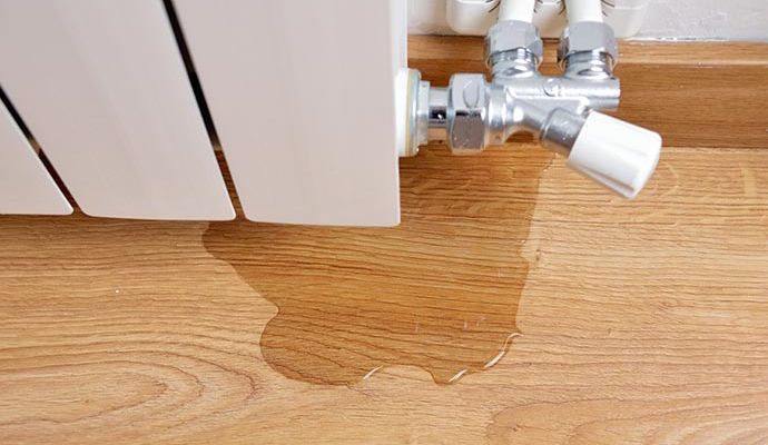 Water damaged floor due to plumbing issue Water damaged floor due to plumbing issue